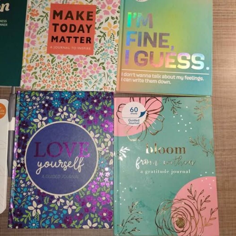 Lot of various guided journals